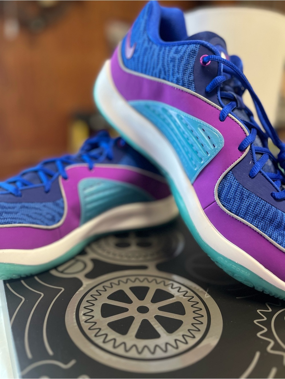Nike men’s Kevin Durant Purple & Blue Sneakers with Teal Accents
